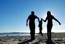 A family on a sandy beach